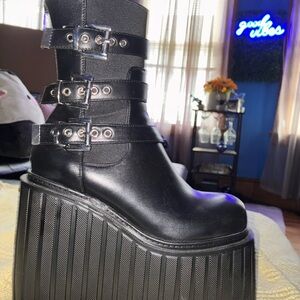 Sleek Black Platform Buckle Boots